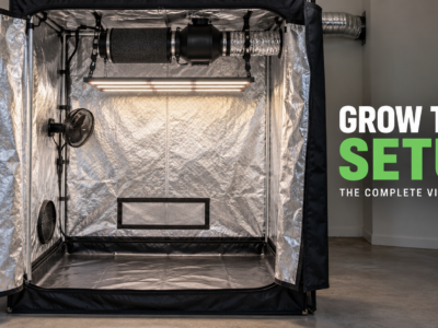 Illustration of an assembled grow tent with an LED light, ventilation system and circulation fan.